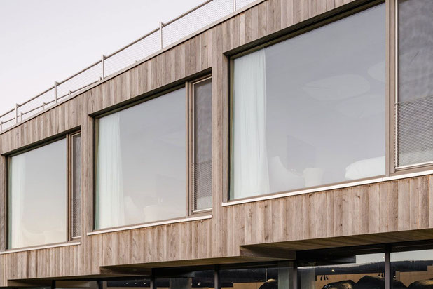 Vue détail façade 1-construction-hotel-Le Chenit