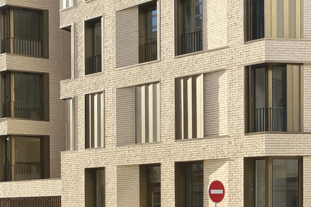 Détail de façade en brique pleine-construction-logement-Paris
