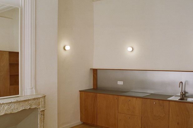 Vue sur la cheminée et la cuisine-renovation-appartement-Montpellier