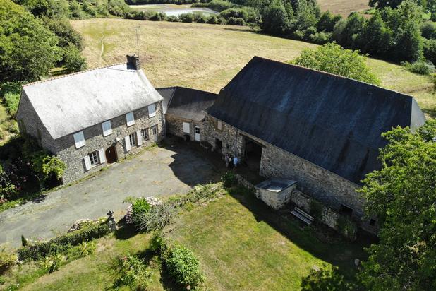 Un presbytère et une grange dimière-construction-logement-Rives-du-Couesnon