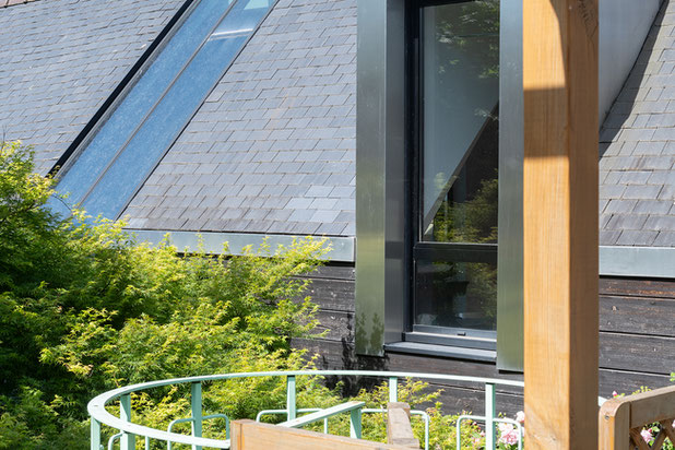 Vue depuis la terrasse avec le bâtiment existant en arrière-plan-agrandissement_extension-maison-Rennes
