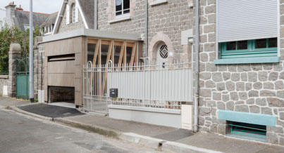 Construction d'un garage-atelier en ossature bois à St-Brieuc Ensemble.s Architecte CNOA Photo d'un projet de Construction Garage à Saint-Brieuc