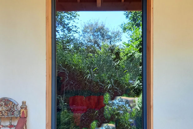 Accès depuis le séjour vers la terrasse-construction-maison-Saint-André-des-Eaux