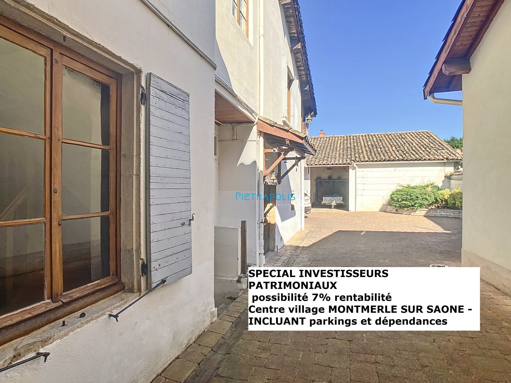 maison avec extérieur et parking -possibilité logements- centre village