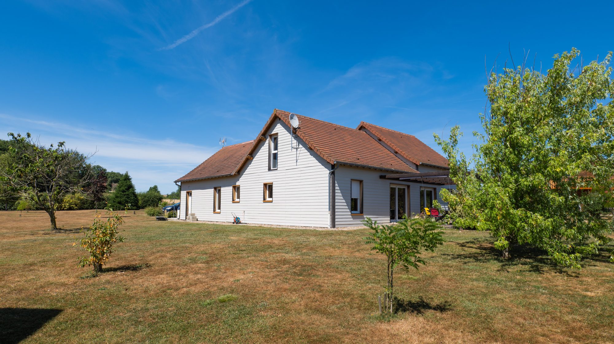 Maison contemporaine en ossature bois, 5 chambres, volumes généreux et confort moderne