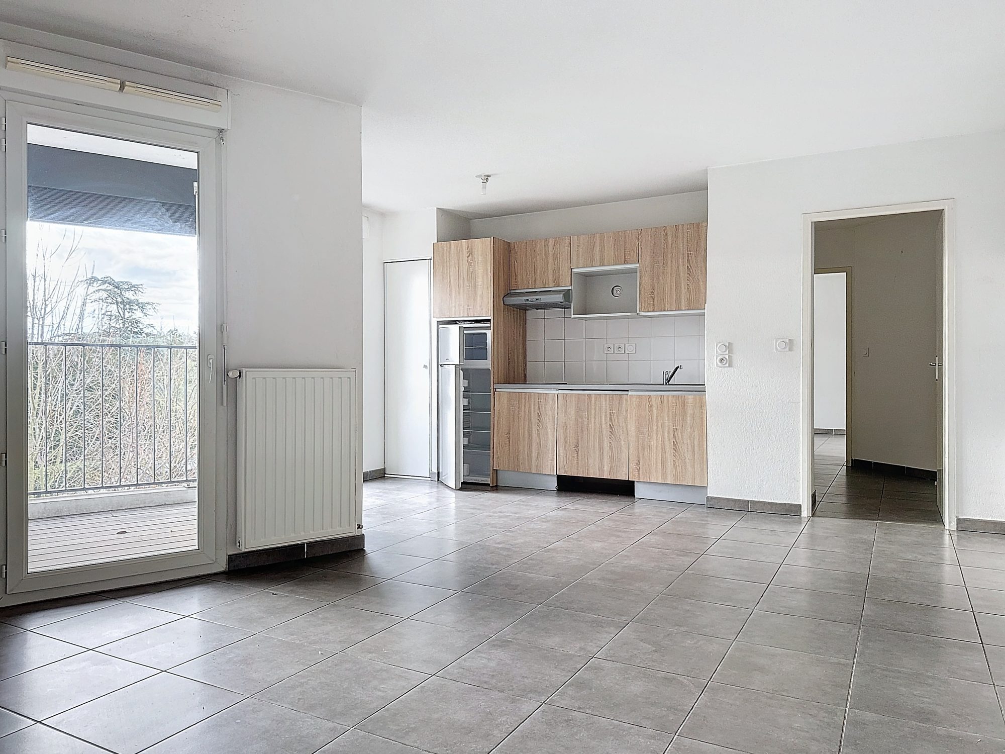 Pietrapolis Chaponost, Appartement T3 secteur Alaï de 2013 avec balcon + 2 places de parking en sous-sol