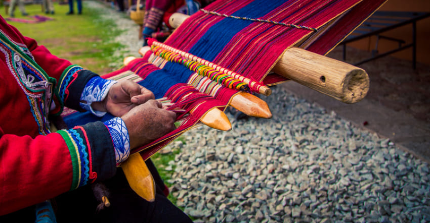 Hands Weaving Traditional Peruvian Blanket