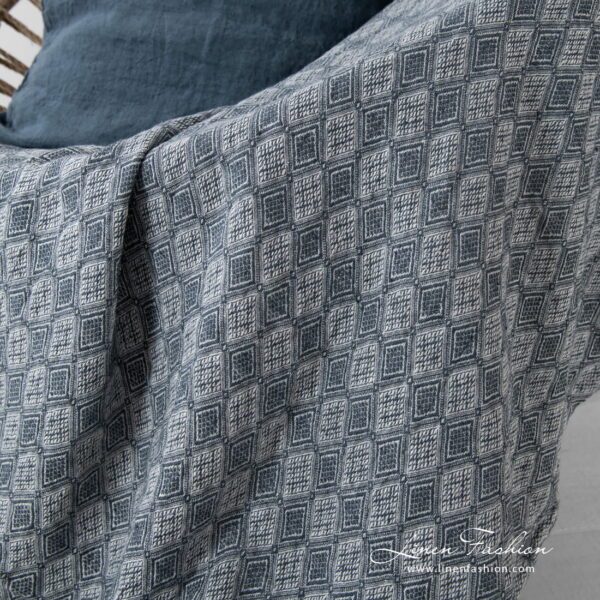 linen blanket with rhombus, white with blue grey.