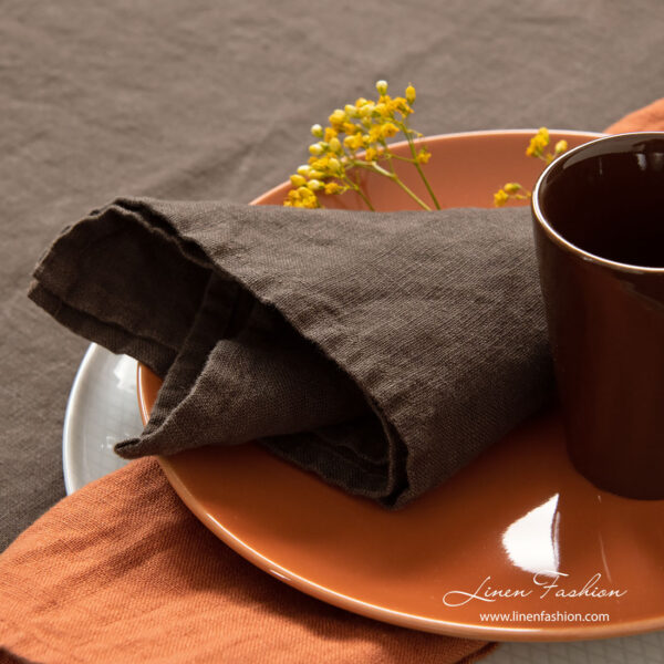 Washed dark brown and orange linen napkins