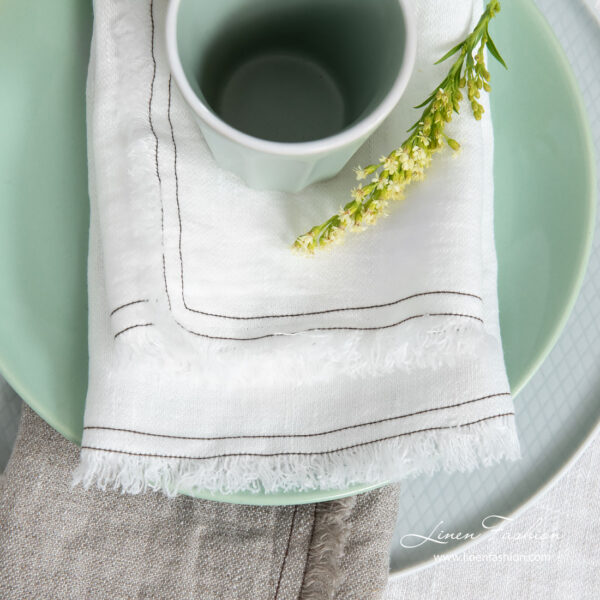Washed white linen napkin with fringes and double stitch
