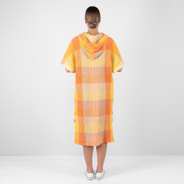 orange linen poncho from backside.