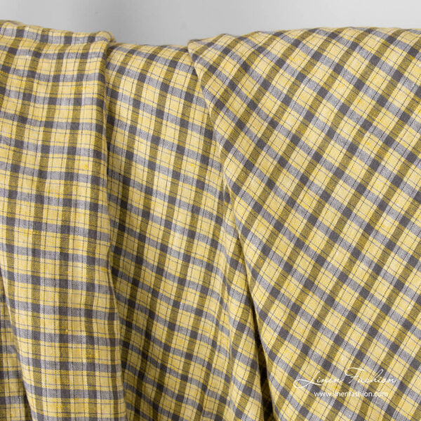 Washed, yellow and grey checked linen fabric