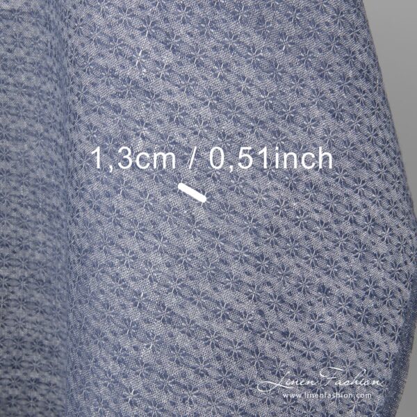 Linen fabric with small blue flowers