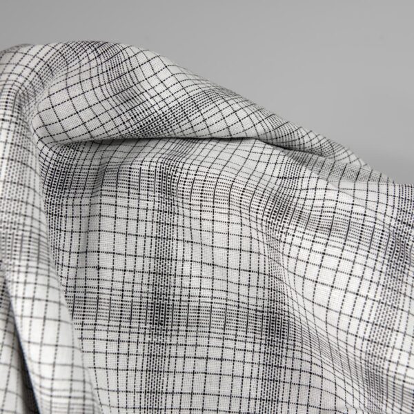 Linen cotton fabric white with black checks close up product view