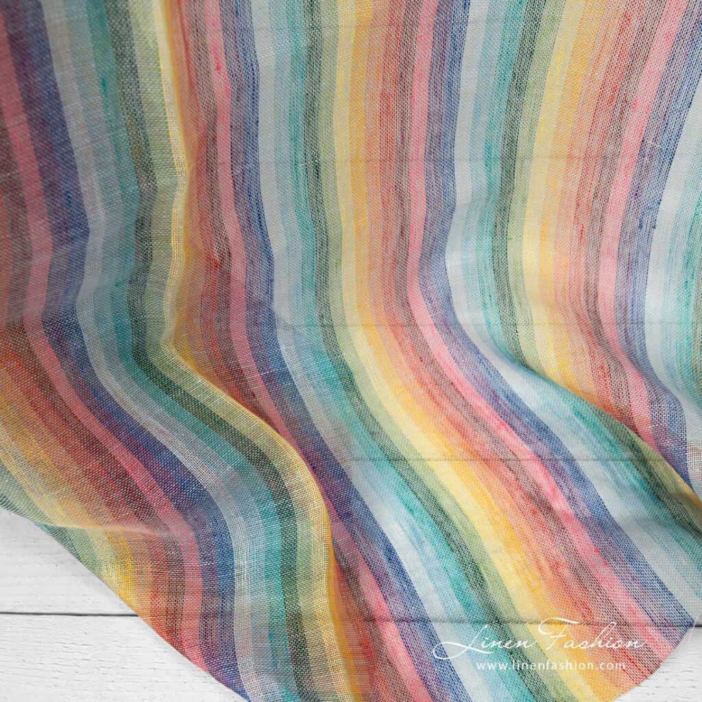 Tissu de lin rayé couleurs arc-en-ciel transparent 4 Linen fabric striped rainbow colours transparent product picture laying