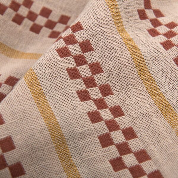 Brown patterned double half-linen fabric washed close up detail