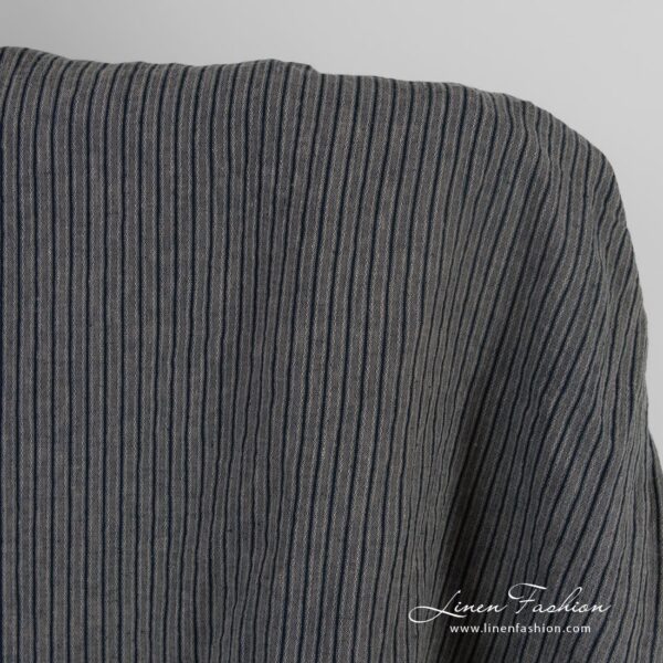 Linen jacquard fabric in black stripes, washed