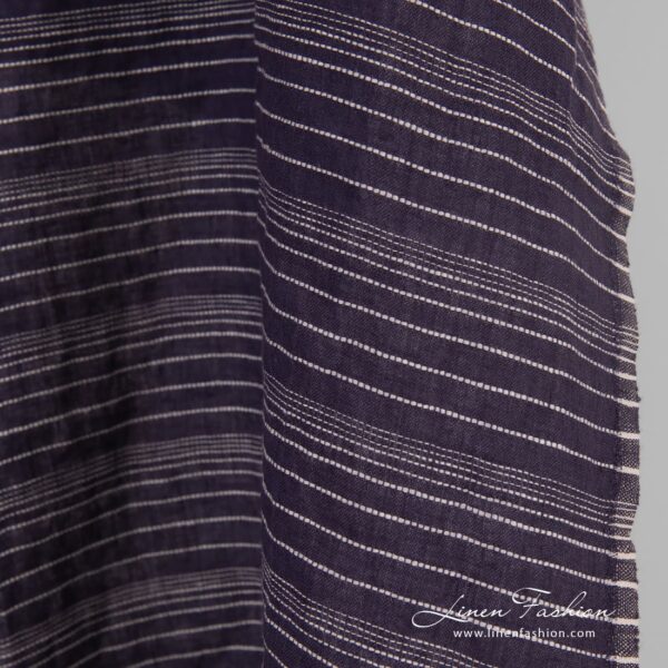 Dark blue linen fabric in stripes, specially washed to increase softness