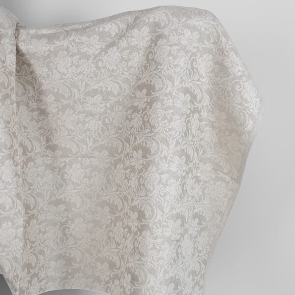 Undyed linen and white cotton fabric with flowers