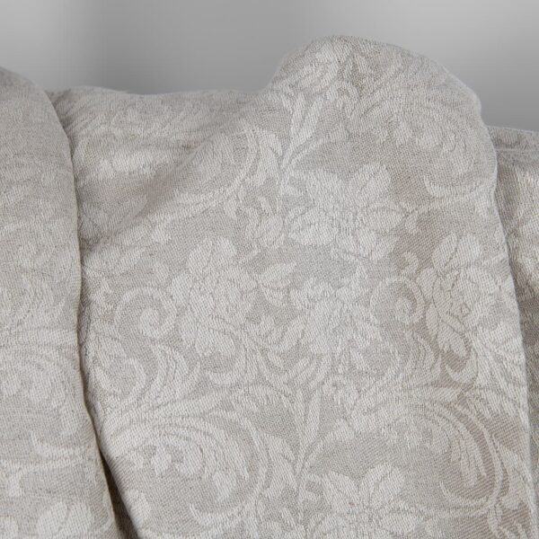 Undyed linen and white cotton fabric with flowers texture