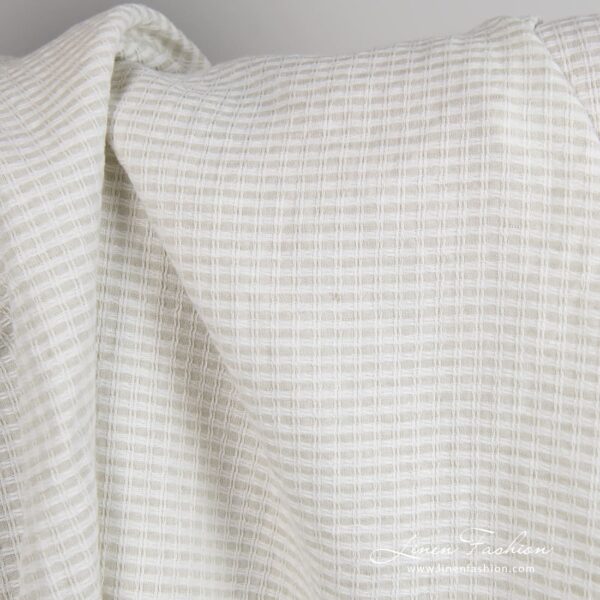 Linen - cotton fabric in checks woven from optical white and light grey yarns