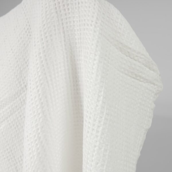 Washed linen cotton fabric off-white waffle close up detail