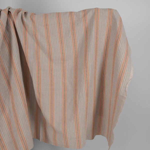 Washed linen cotton in brown patterned stripes