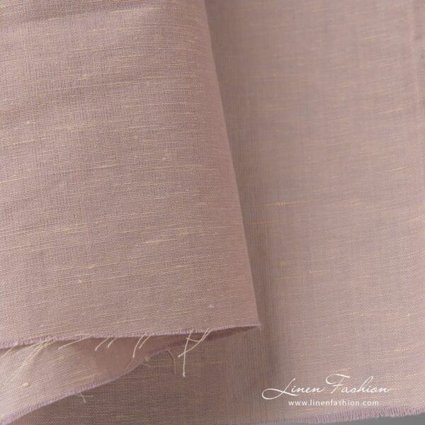 Linen cotton melange fabric has been woven from light yellow (cream colour) and light lilac (pink violet colour) yarns