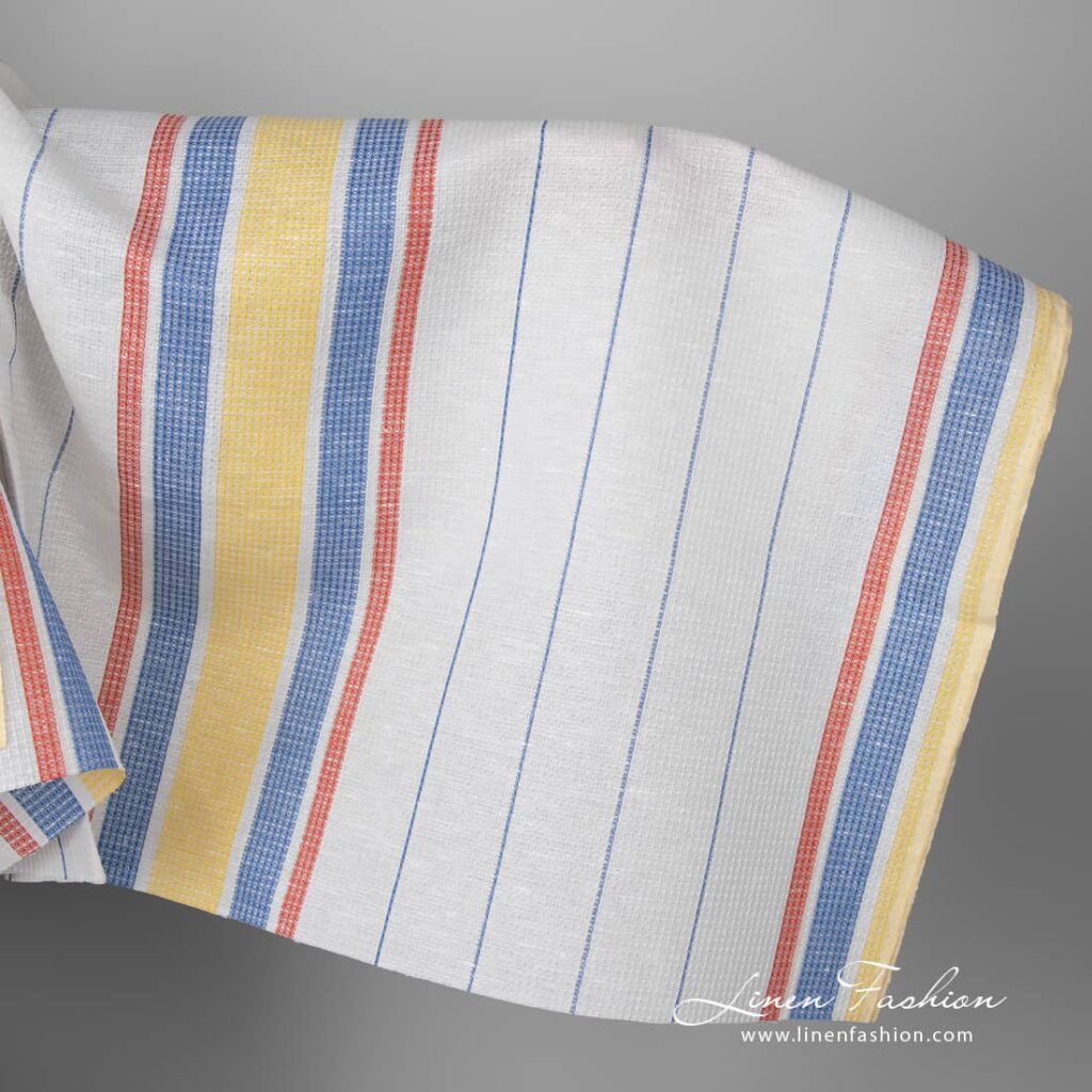 Tissu de lin et de coton gaufré blanc avec des rayures jaunes et rouges 1 Linen cotton fabric white waffle with yellow red stripes