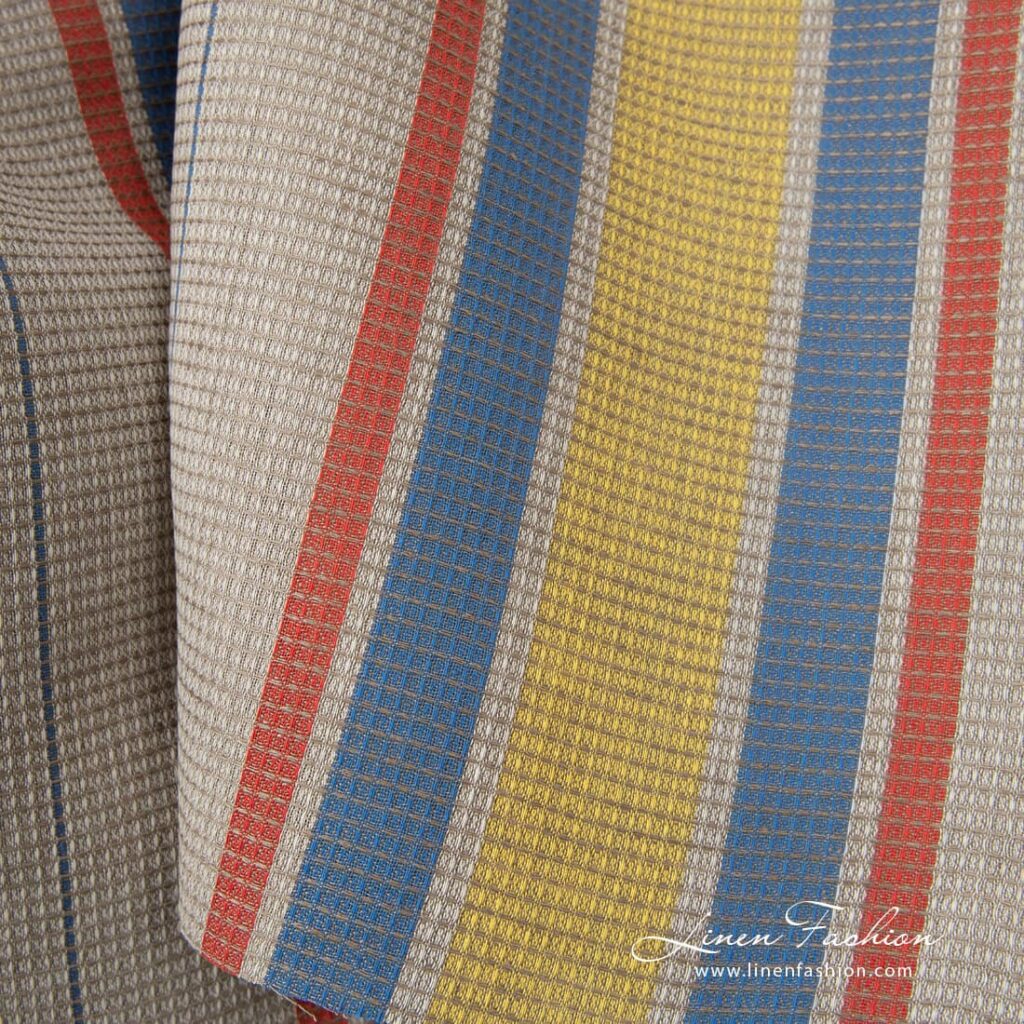 Tissu de lin et de coton gaufré sable avec rayures jaunes et rouges 2 Linen cotton fabric sand waffle with yellow red stripes product photo