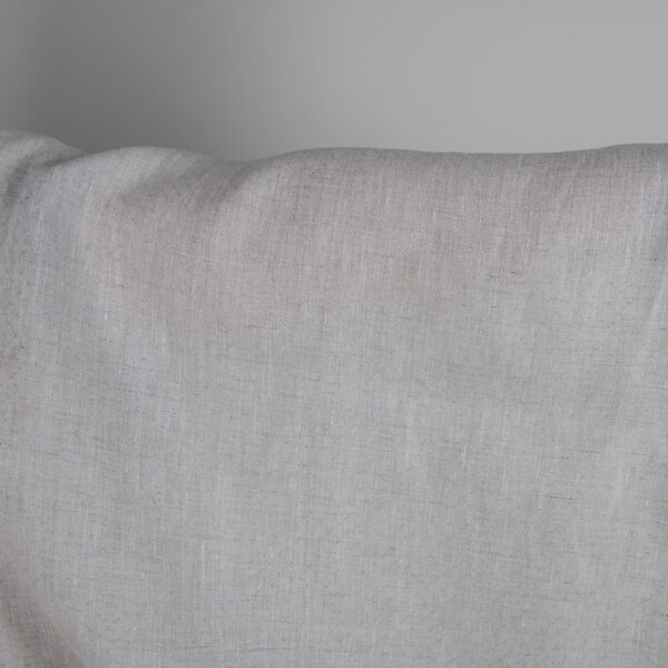 Patterned fabric undyed linen and white mix close up detail