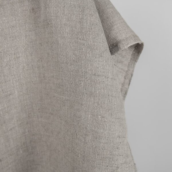 Natural linen fabric in an openwork pattern edge