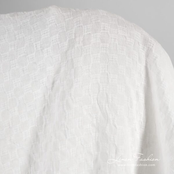 Optical white linen fabric in checks, washed