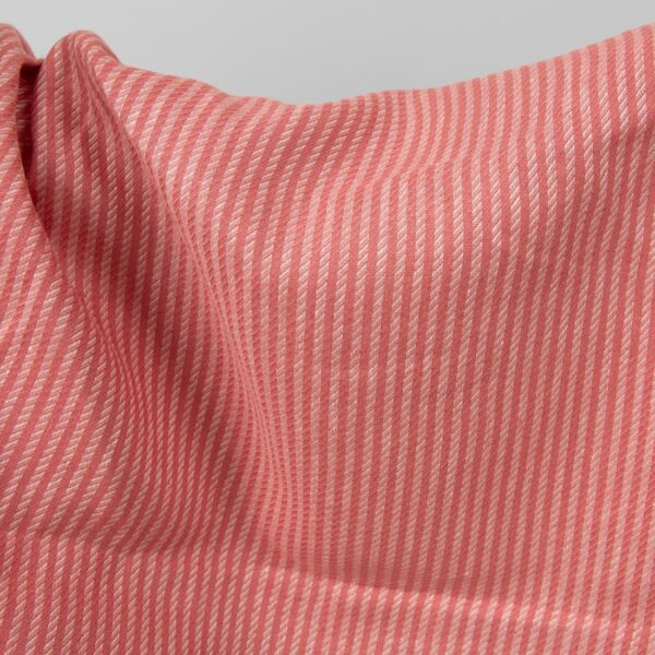 Red striped pure linen fabric close up detail