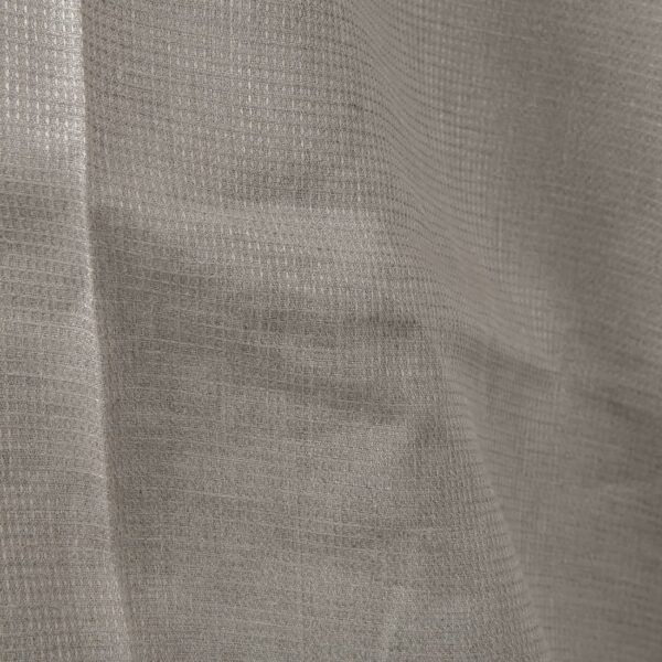 Checked linen fabric in grey natural flax colour close up detail