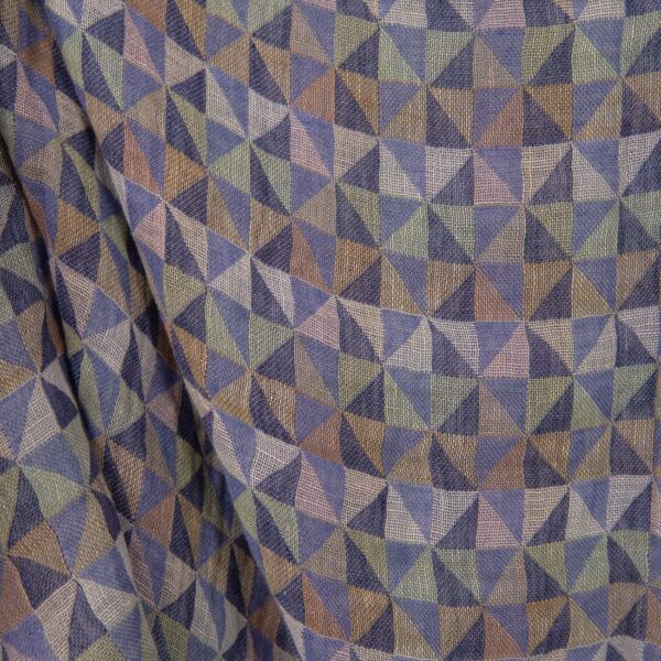 Washed linen fabric in violet multicolour triangles close up detail