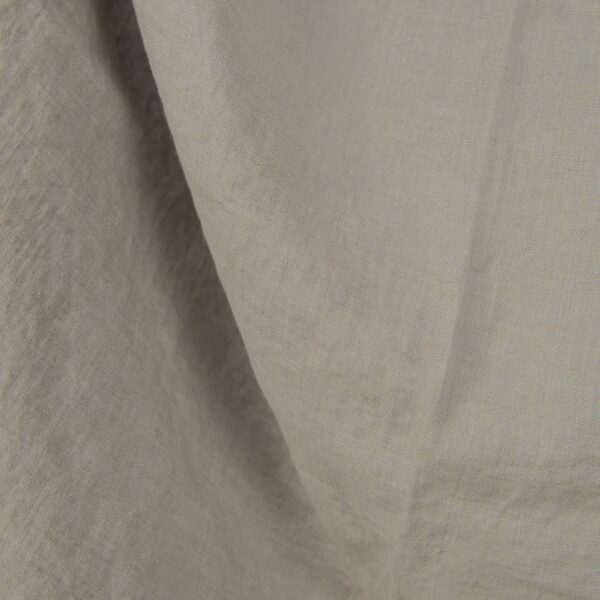 Washed linen fabric cool grey beige colour close up detail