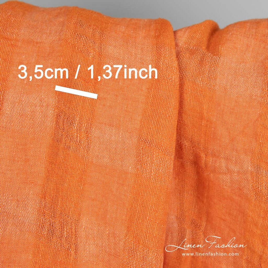 Tissu de lin orange à carreaux transparents lavés 4 Linen fabric in transparent checks woven from orange and peach yarns