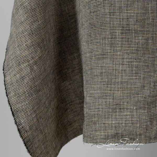 Washed 100% linen fabric in checks.