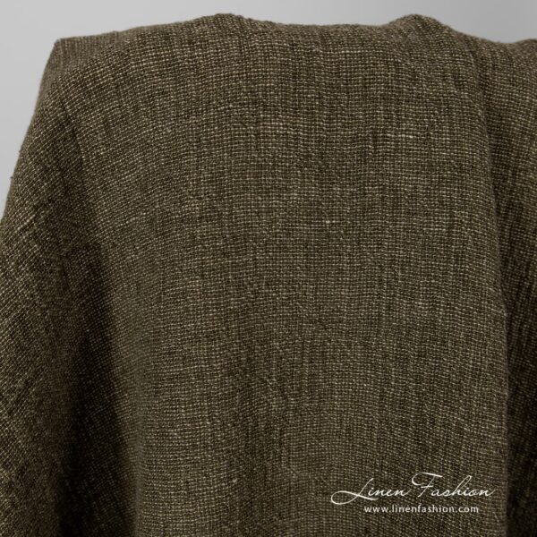 Washed linen fabric in moss green.
