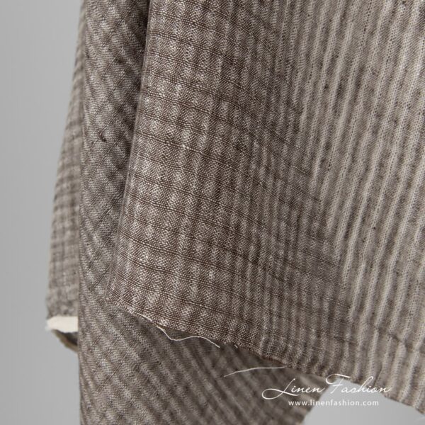 Brown dyed linen fabric in checks.