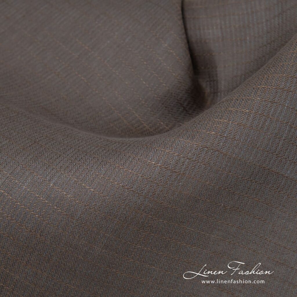 Tissu en lin gris brun à chevrons 4 Herringbone grey brown linen fabric.