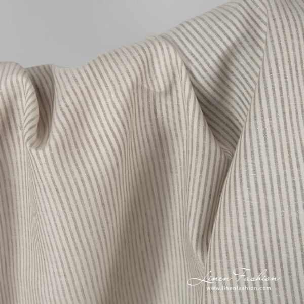 Beige linen fabric in stripes.