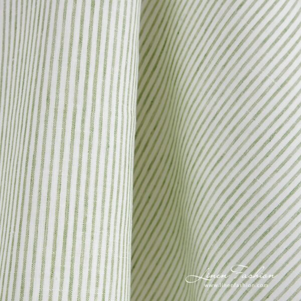 Linen fabric in vertical green stripes