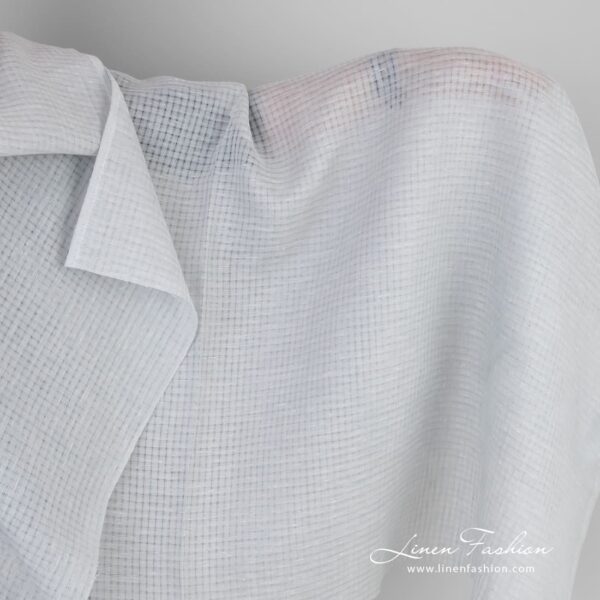 Bluish grey linen fabric in transparent checks