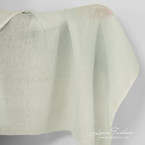 Pale green linen fabric.