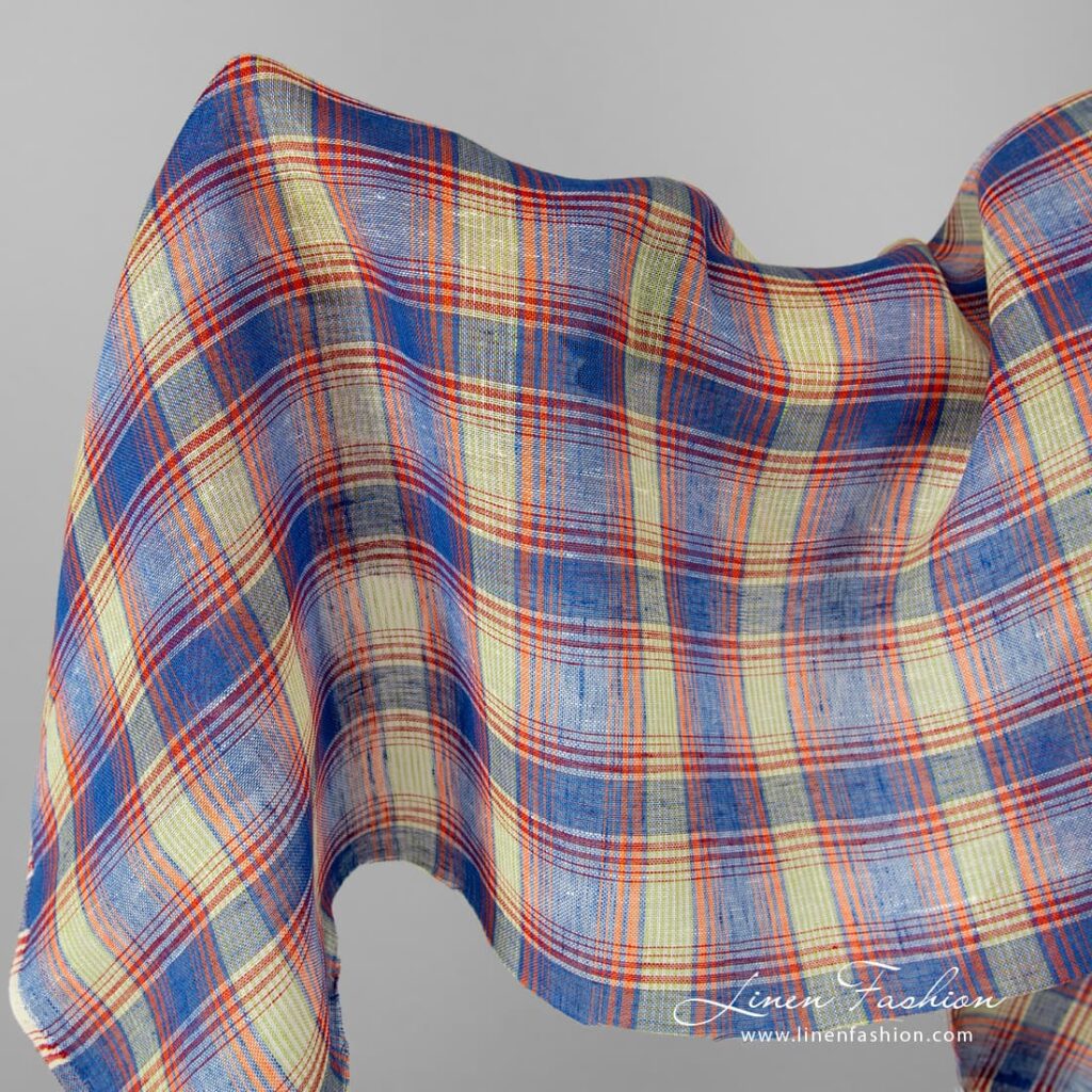 Tissu de lin transparent à carreaux bleu-orange 1 Transparent linen fabric in blue orange checks.