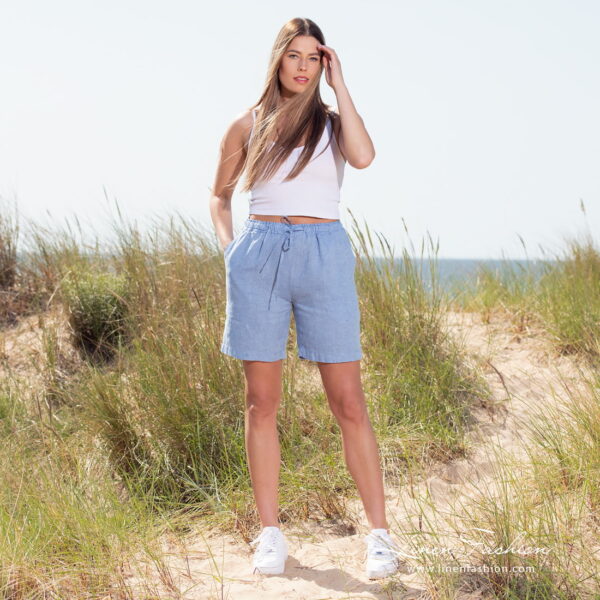 linen blue shorts in full view.