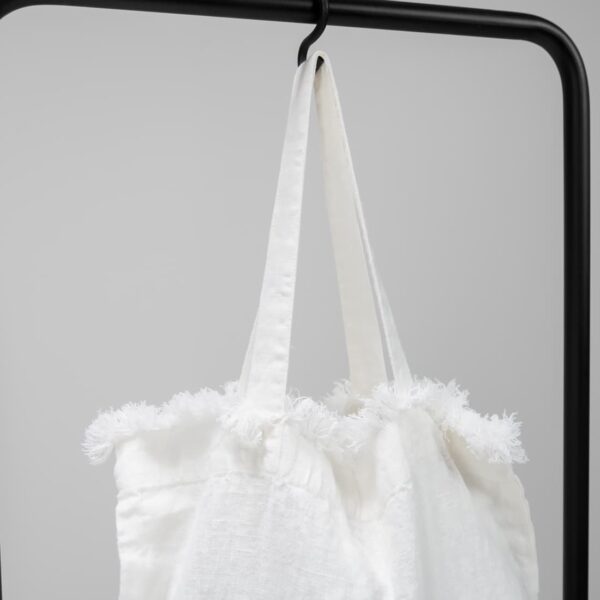white washed linen bag with fringes