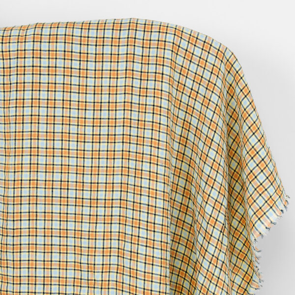 Tissu de lin à carreaux orange et bleu pâle, lavé